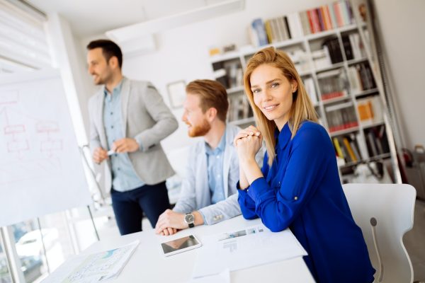 Group of business people working as team in office